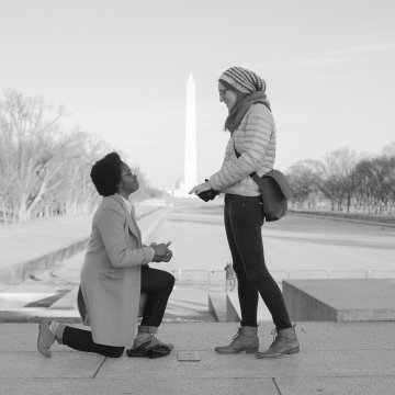 Kiva proposes to Laurel at the Lincoln Memorial in front of the Washington Monument