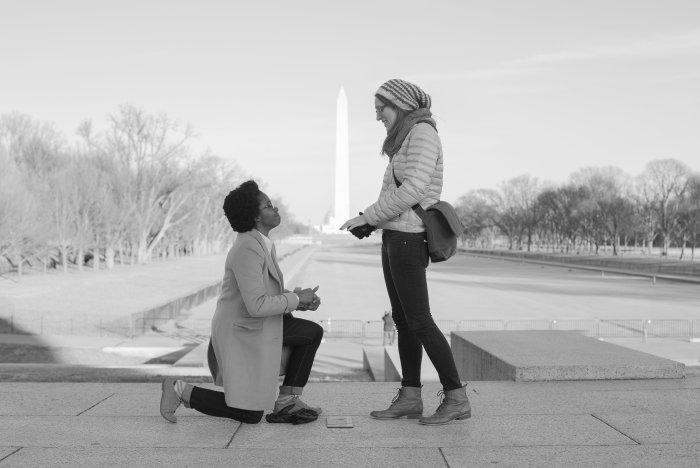 Kiva proposes to Laurel at the Lincoln Memorial in front of the Washington Monument